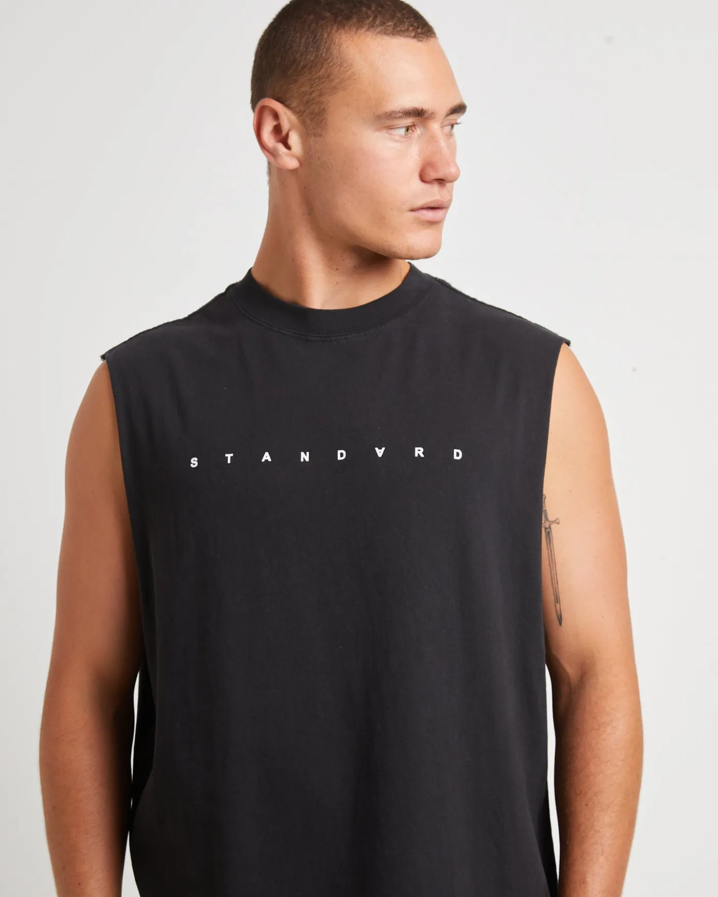 Kerning Muscle Tee in Black