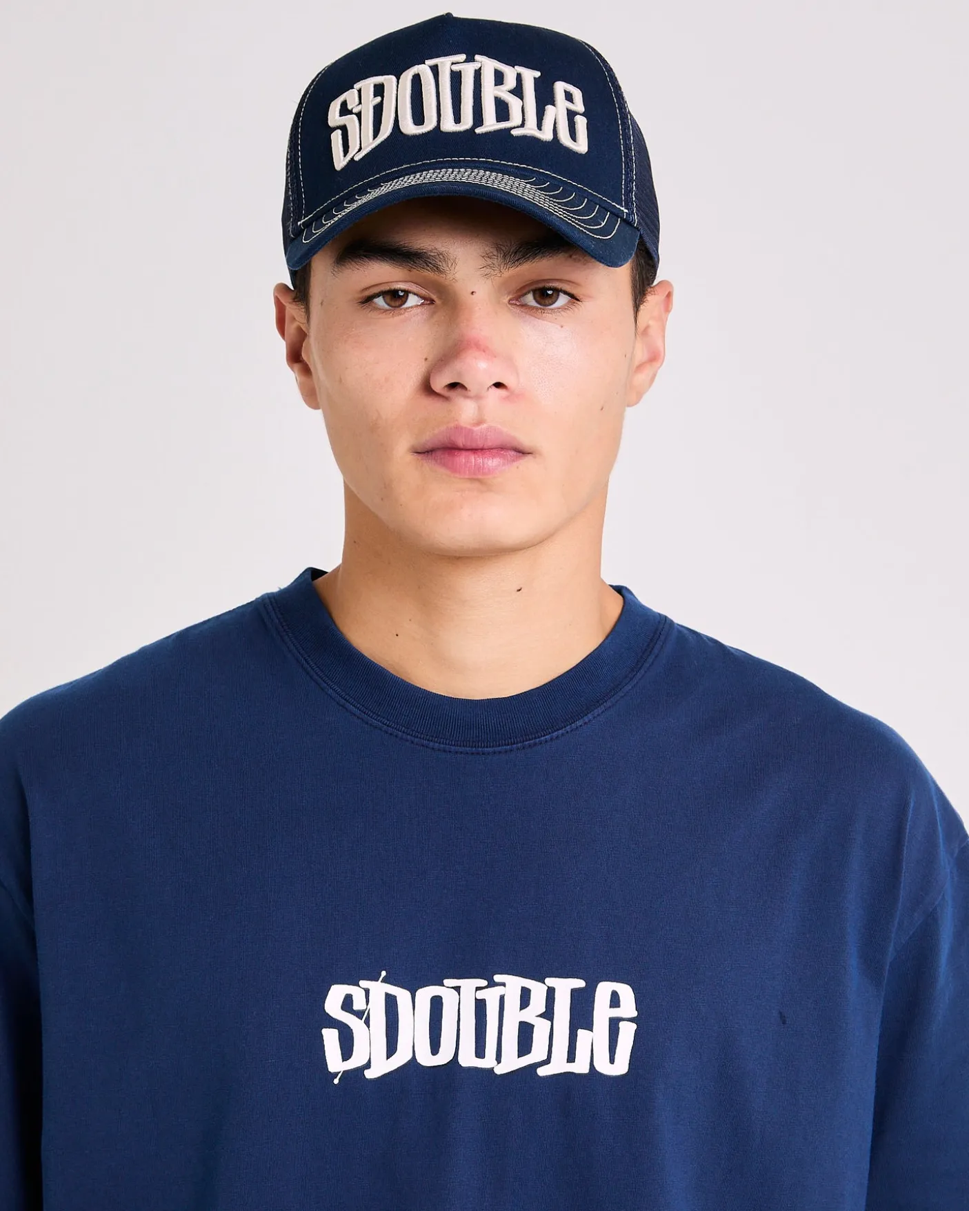 Mid-Block Curved Peak Trucker Cap