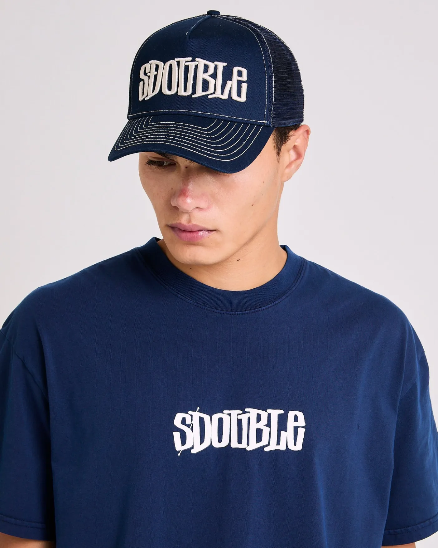 Mid-Block Curved Peak Trucker Cap